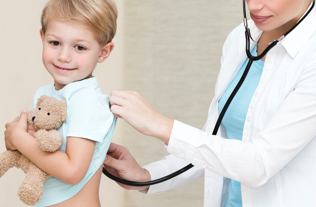 Happy boy visiting doctor